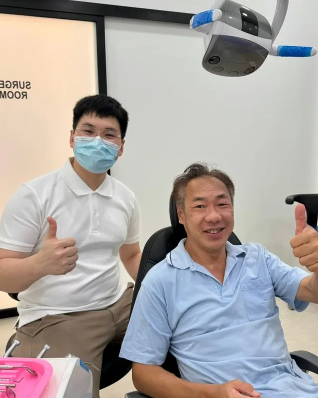 Ivory Dental team member with a patient in the treatment room