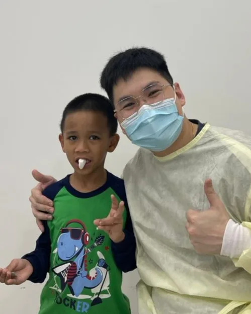Ivory Dental team member with a young patient